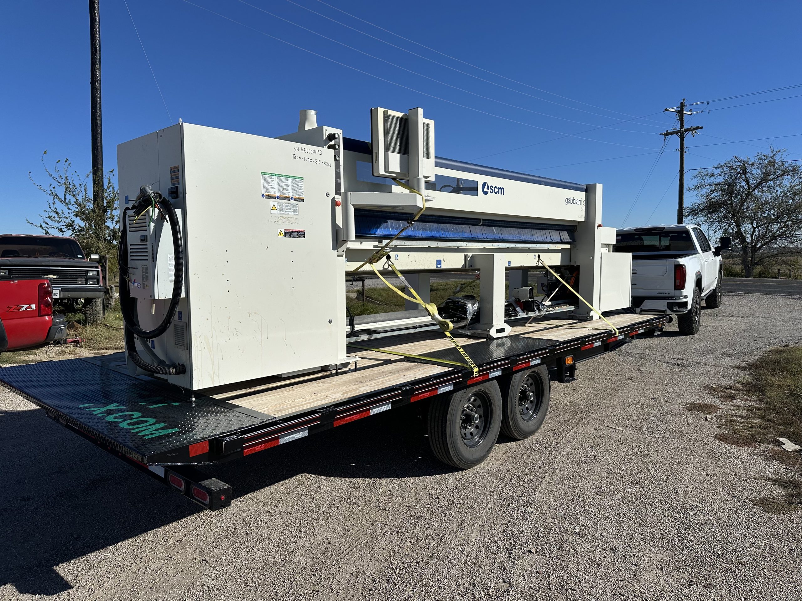 22ft Diamond C Deck-Over Tilt trailer with 12k winch and 4 tie-down straps