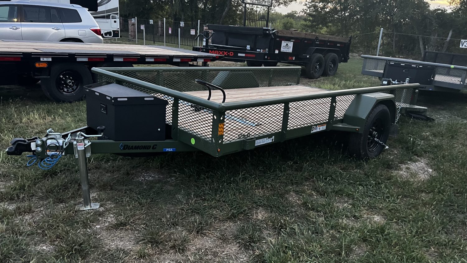 12 foot Diamond C utility trailer rental in McKinney TX with ramp gate and treated wood floor